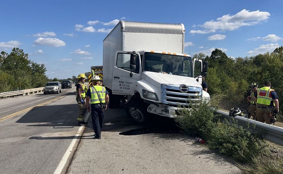 Driver injured and SLT lane closed as crews clean up fuel after crash